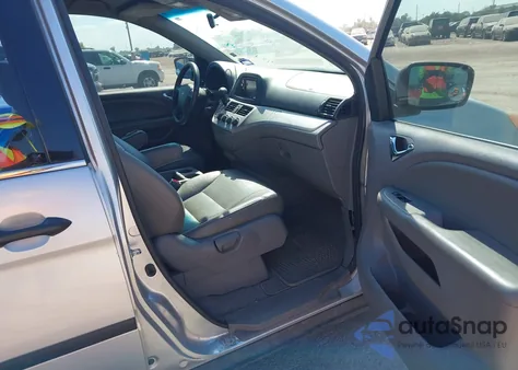 2010 Honda Odyssey Lx z USA, uszkodzony, nr VIN 5FNRL3H23AB025063